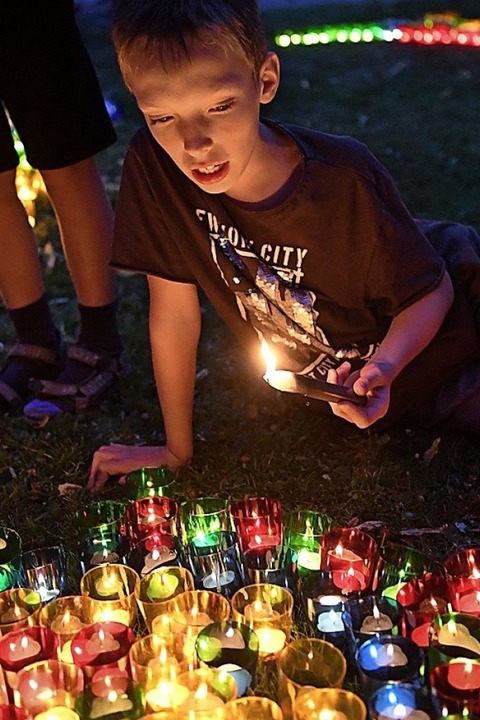 Glanzlichter am Festhimmel: Tausende Kerzen erhellen die Parks - Badische Zeitung TICKET