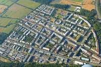Freiburgs Baubrgermeister will im Streit um Wohnungen in Rieselfeld vermitteln